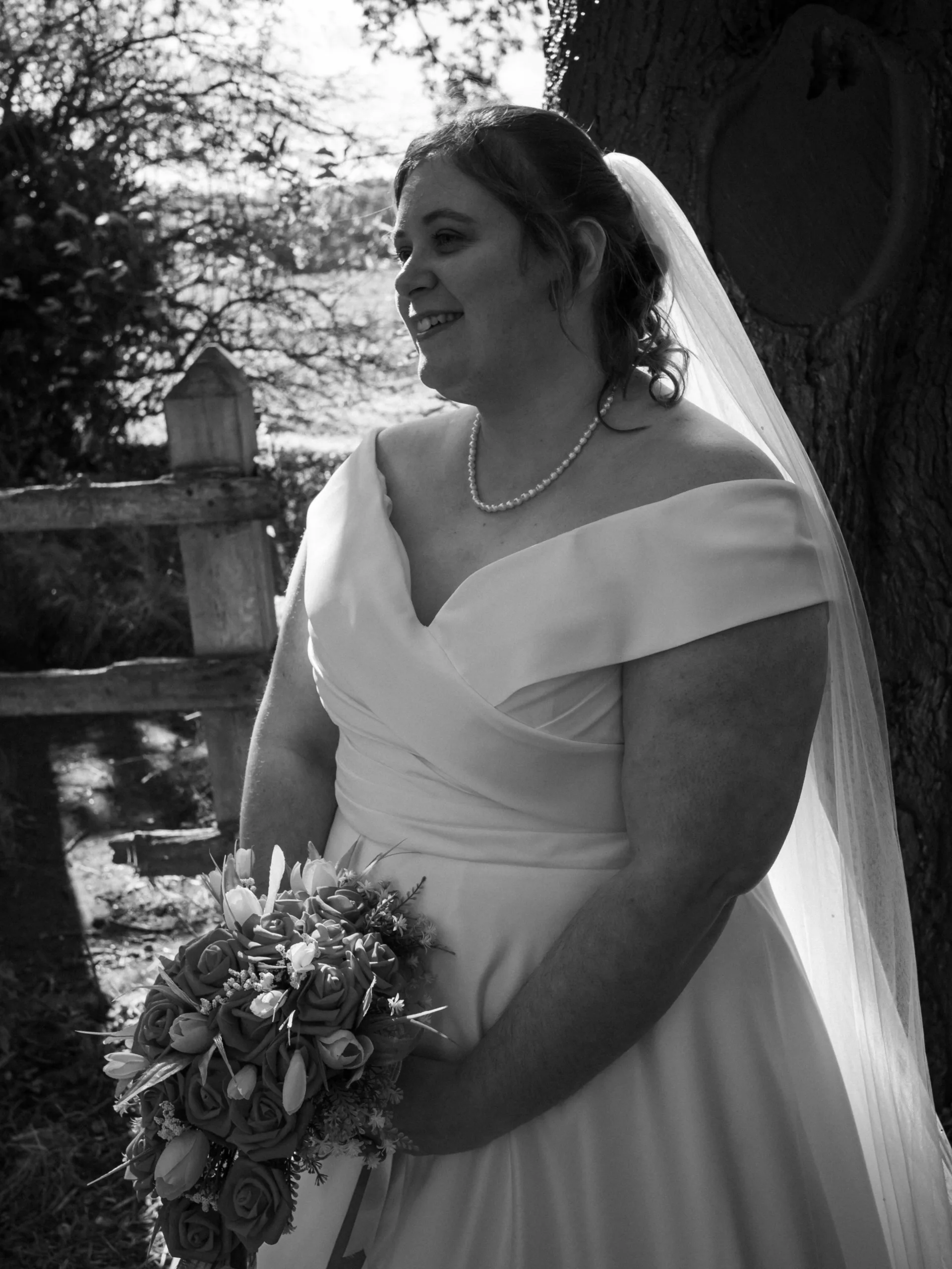 A black and white photo of a bride in a wedding dress, captured in Cleethorpes.