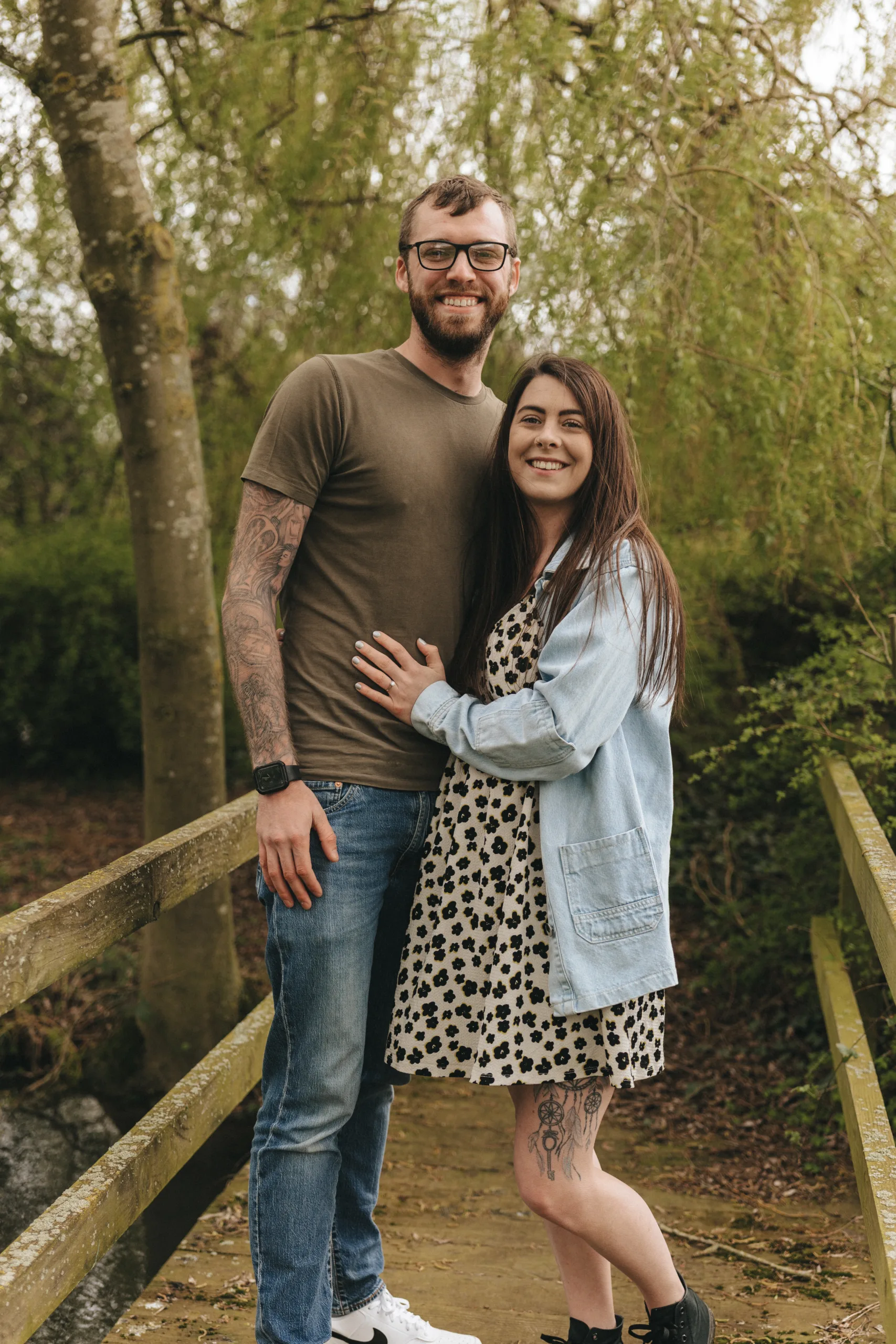 A man and woman standing on a bridge in Yorkshire for a photography shoot.