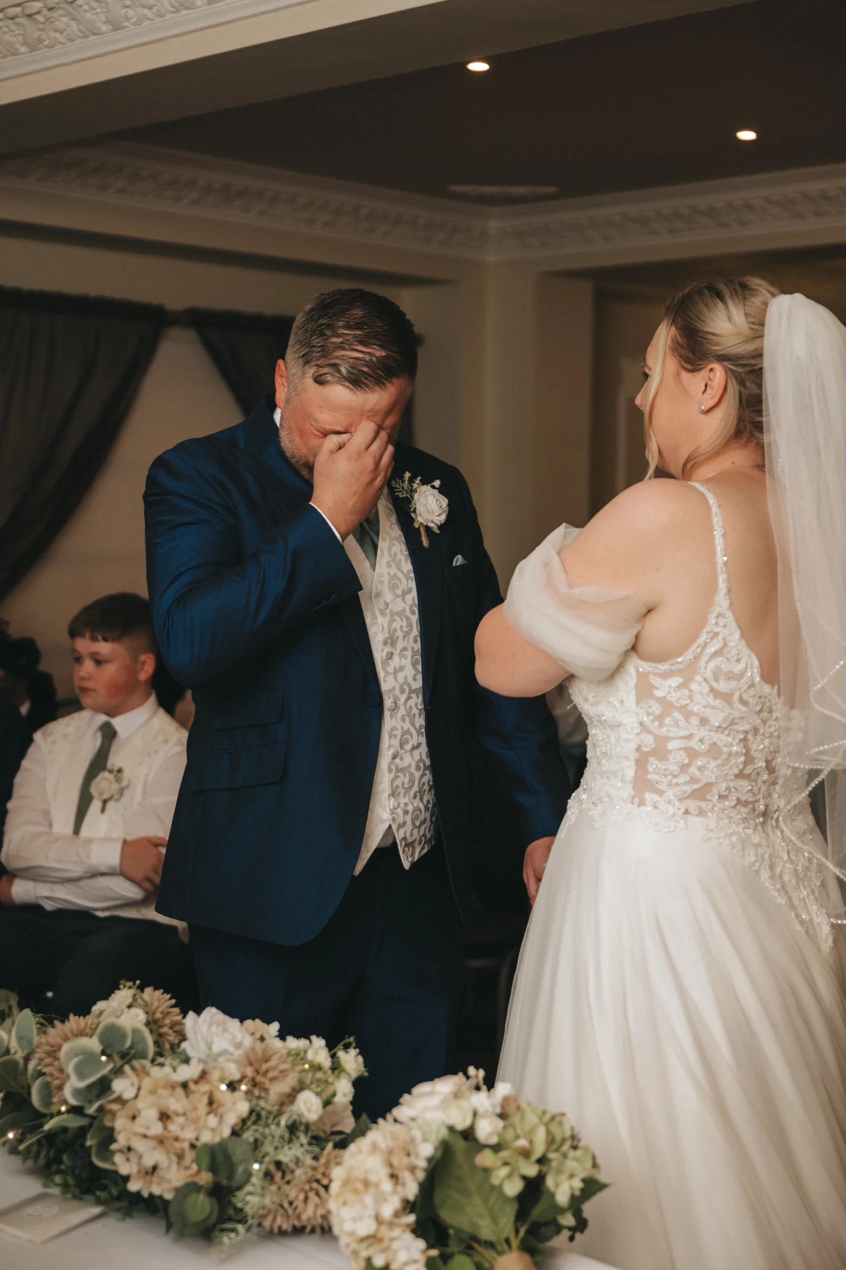 A wedding couple crying during their ceremony in Yorkshire.