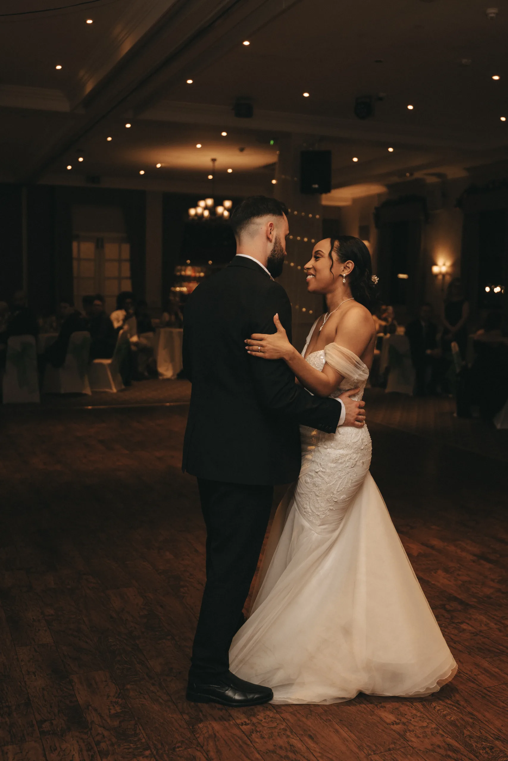 A bride and groom sharing their first dance at a wedding reception in Yorkshire.