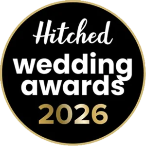 A circular black badge with a thin gold border. The text reads "Hitched wedding awards 2026," perfect for celebrating natural wedding photography, with "Hitched" in white script and bold white letters, and "2026" in large gold numbers at the bottom. © Aimee Lince Photography - Wedding photographer in Lincolnshire, Yorkshire & Nottinghamshire