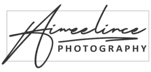 The logo reads “Aimée Lince Photography.” “Aimée Lince” is written in a dark, stylised cursive script, while “PHOTOGRAPHY” is centred below in a bold, dark sans-serif font, all enclosed within a thin light grey rectangular border. © Aimee Lince Photography